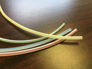 Striped fluoropolymer tubing